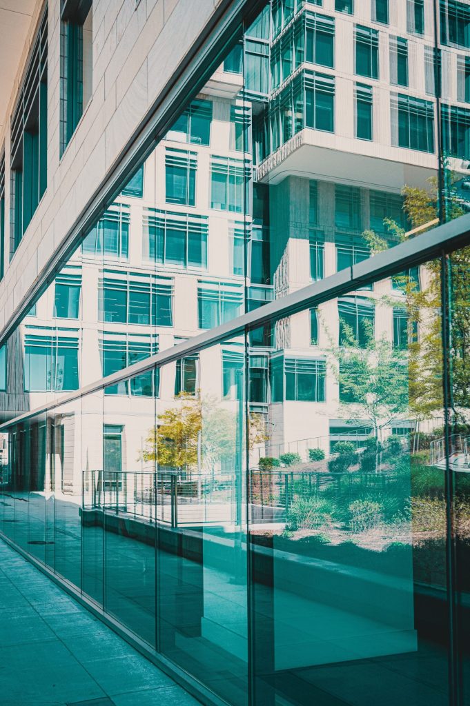 Reflection of modern architecture on glass windows in urban Boise, Idaho.