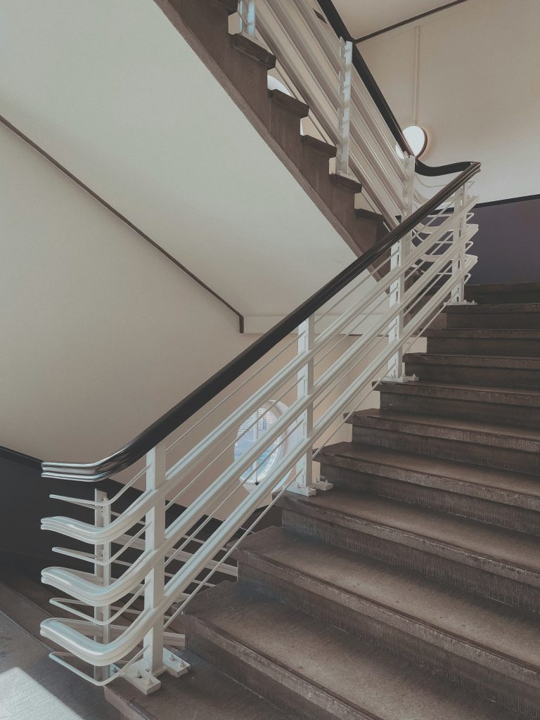 white and brown wooden staircase